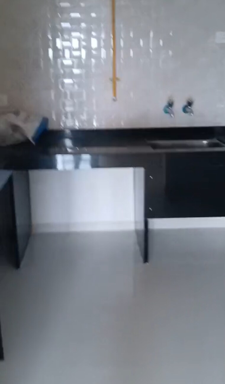 Kitchen, nyati-elan 2 Bedroom 585 Sq.Ft. Apartment In Wagholi Pune 9121149