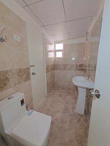 Bathroom in 3 BHK Apartment at Gaurs Siddhartham, Siddharth Vihar – for Rent
