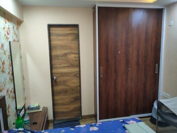 Bedroom in 2 BHK Apartment at KFP Chesterfield, Dhanori – for Rent