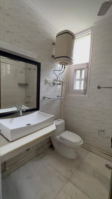 Bathroom in 3 BHK Builder Floor at Sukhdev Vihar – for Rent