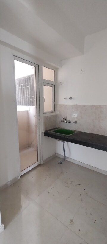 Kitchen in 2 BHK Apartment at Signature The Millennia 2, Sector 37d – for Rent