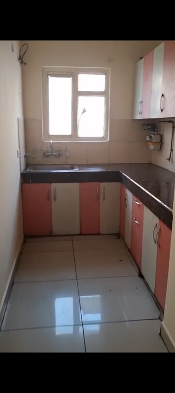 Kitchen in 2 BHK Apartment at Panchsheel Greens, Sector 16 Greater Noida – for Rent