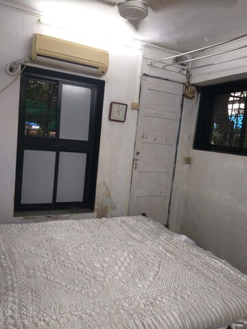 Bedroom in 2 BHK Apartment at Mandpeshwar Dham CHS, Ic Colony – for Rent