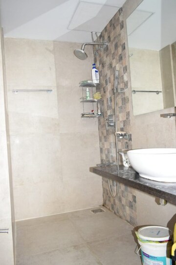 Bathroom in 1 BHK Apartment at Omkar Meridia, Kurla West – for Rent