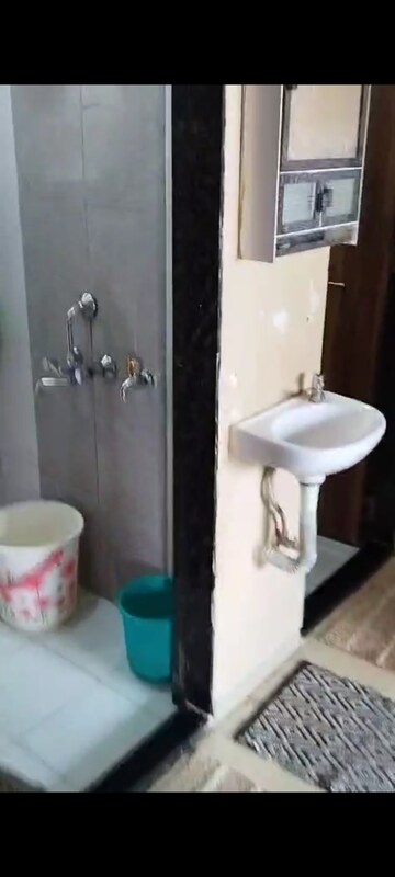 Bathroom in 1 BHK Apartment at Rubberwala Fuego, Grant Road – for Sale