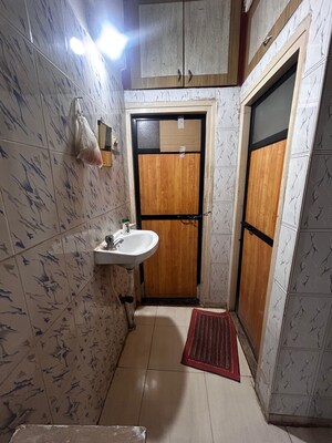 Kitchen in 1 BHK Apartment at Agarwal And Doshi Complex, Vasai West – for Sale