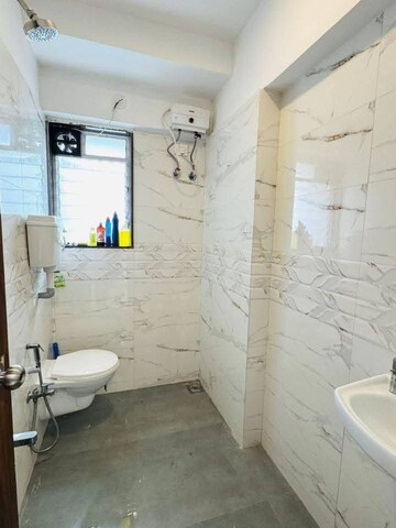 Bathroom in 2 BHK Apartment at Agarwal And Doshi Complex, Vasai West – for Sale