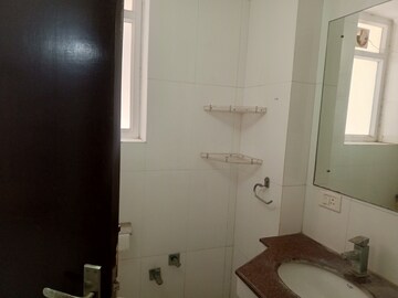 Bathroom in 4 BHK Apartment at Abhinandan CGHS, Sector 51 – for Rent
