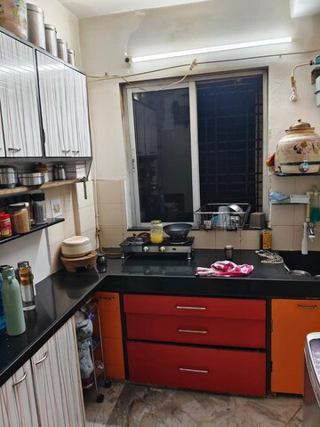 Kitchen in 1 BHK Apartment at Rajiv CHS, Bandra East – for Rent