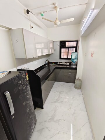 Kitchen in 1 BHK Apartment at Duville Riverdale Suites, Kharadi – for Rent