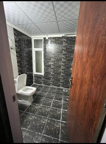 Bathroom in 2 BHK Apartment at Migsun Roof, Raj Nagar Extension – for Sale