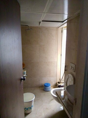 Bathroom in 1.5 BHK Apartment at Dosti West County, Balkum Pada – for Sale