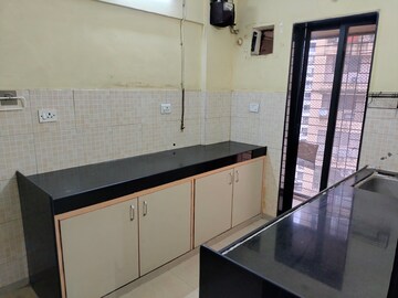 Kitchen in 1 BHK Apartment at Lalani Residency, Kavesar – for Rent