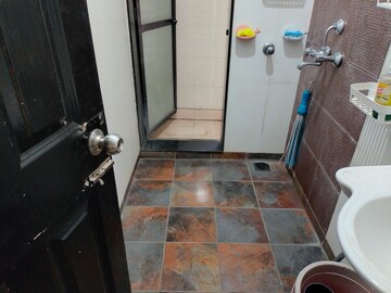 Bathroom in 1 BHK Apartment at Lalani Residency, Kavesar – for Rent