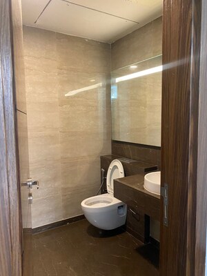 Bathroom in 3 BHK Apartment at Smart World Orchard, Sector 61 – for Sale