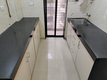 Kitchen in 1 BHK Apartment at Lalani Residency, Kavesar – for Rent