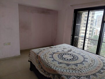 Bedroom in 1 BHK Apartment at Lalani Residency, Kavesar – for Rent