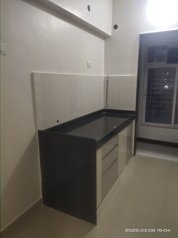 Kitchen in 2 BHK Apartment at Hubtown Greenwoods, Vartak Nagar – for Rent