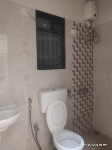 Bathroom in 2 BHK Apartment at Hubtown Greenwoods, Vartak Nagar – for Rent
