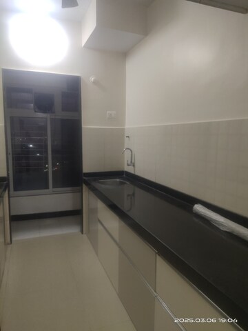 Kitchen in 2 BHK Apartment at Hubtown Greenwoods, Vartak Nagar – for Rent