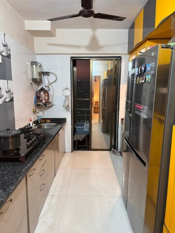 Kitchen in 2 BHK Apartment at Lodha Luxuria, Majiwada – for Rent