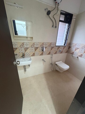 Bathroom in 2 BHK Apartment at Kesar Scion, Ghatkopar East – for Rent