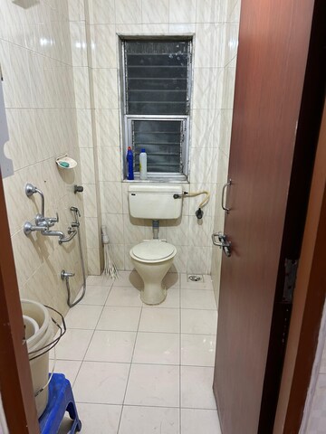 Bathroom in 2 BHK Apartment at Silver Sand CHS, Andheri West – for Rent