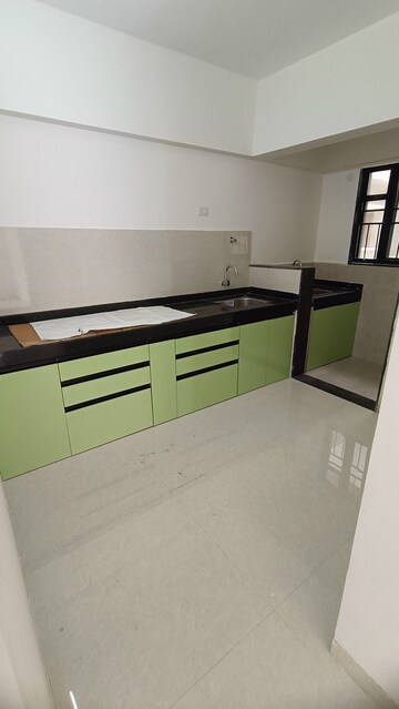Kitchen in 2.5 BHK Apartment at Kohinoor Viva City, Dhanori – for Rent