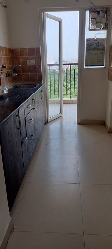 Kitchen in 2 BHK Apartment at Aims Golf Avenue II, Sector 75 – for Rent