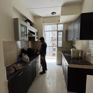 Kitchen in 2.5 BHK Apartment at Prateek Wisteria, Sector 77 – for Rent
