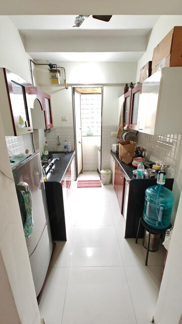 Kitchen in 1 BHK Apartment at Bhoomi Acres, Waghbil – for Rent
