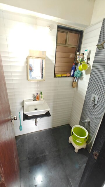 Bathroom in 1 BHK Apartment at Bhoomi Acres, Waghbil – for Rent