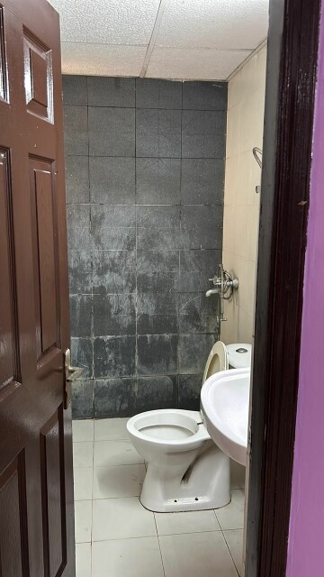 Bathroom in 2 BHK Apartment at Windsor Paradise 2, Raj Nagar Extension – for Rent