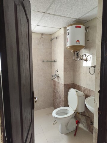 Bathroom in 3 BHK Apartment at Aims Golf City, Sector 75 – for Rent