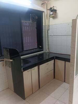 Kitchen in 1 BHK Apartment at Shree Ram Bhavan, Malad West – for Sale