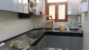 Kitchen in 3 BHK Builder Floor at Mahavir Enclave 1 – for Sale