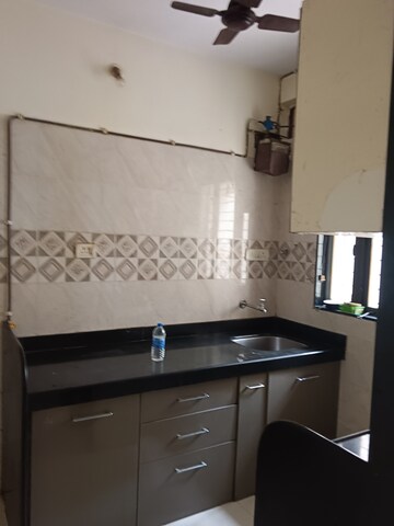 Kitchen in 1 BHK Apartment at Krishnatara CHS, Goregaon West – for Rent