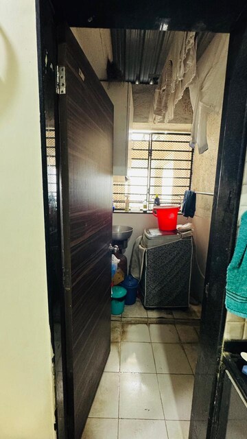 Bathroom in 2 BHK Apartment at Wadhwani Sai Paradise, Punawale – for Rent