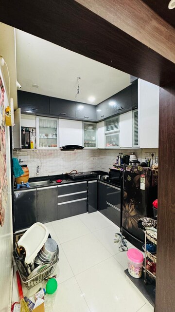 Kitchen in 2 BHK Apartment at Wadhwani Sai Paradise, Punawale – for Rent