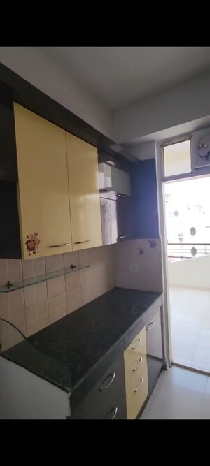 Kitchen in 2 BHK Apartment at Ajnara Gen X, Dundahera – for Sale