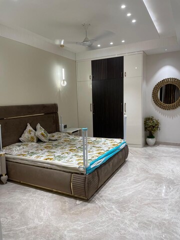 Bedroom in 4 BHK Builder Floor at Dlf Phase iv – for Rent