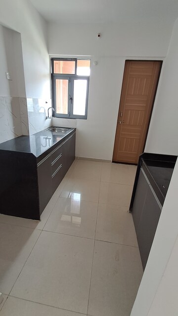 Kitchen in 2 BHK Apartment at Lodha Panacea 1, Dombivli East – for Rent