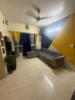 Living Room in 2 BHK Apartment at Lodha Amara, Kolshet Road – for Sale