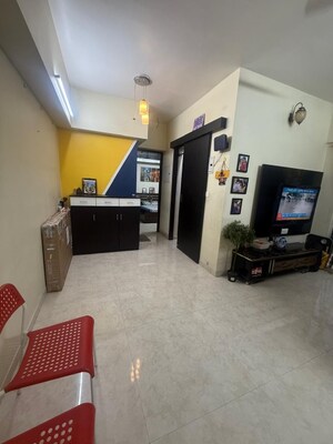 Living Room in 2 BHK Apartment at Lodha Amara, Kolshet Road – for Sale