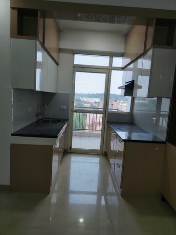 Kitchen in 2 BHK Apartment at Suncity Avenue 76, Sector 76 – for Rent