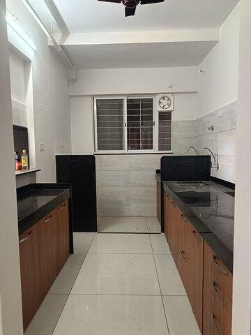 Kitchen in 1 BHK Apartment at Kumar Palaash A, Wadgaon Sheri – for Rent