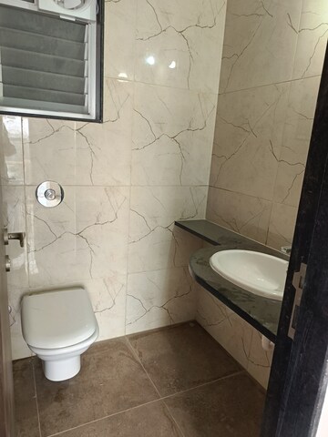 Bathroom in 1 BHK Apartment at Kumar Palaash A, Wadgaon Sheri – for Rent
