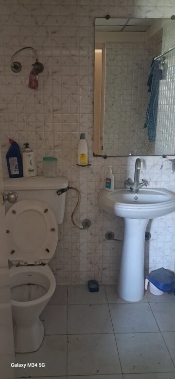 Bathroom in 3.5 BHK Apartment at Gaur City 6th Avenue, Sector 4 Greater Noida – for Rent