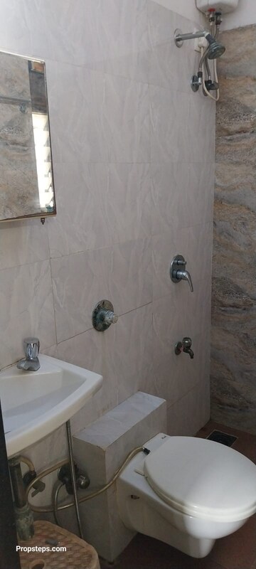 Bathroom in 1 BHK Apartment at Sethia Green View, Goregaon West – for Rent
