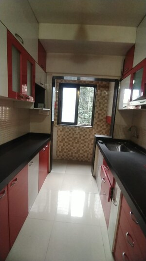 Kitchen in 1 BHK Apartment at Sudarshan Sky Garden, Ghodbunder Road – for Sale